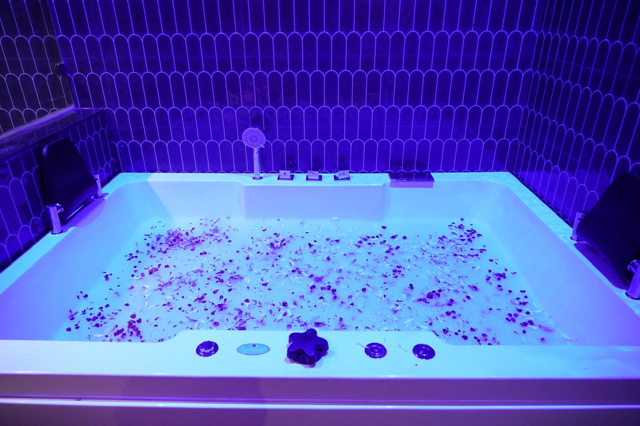 Jacuzzi filled with rose petals