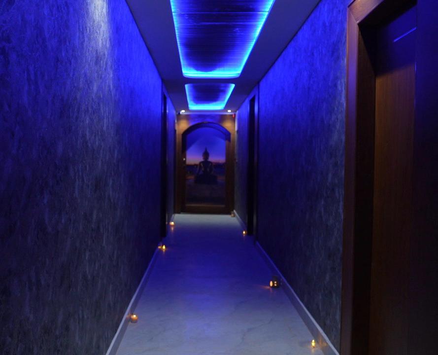 Aeris Spa entrance hallway with ambient blue lighting