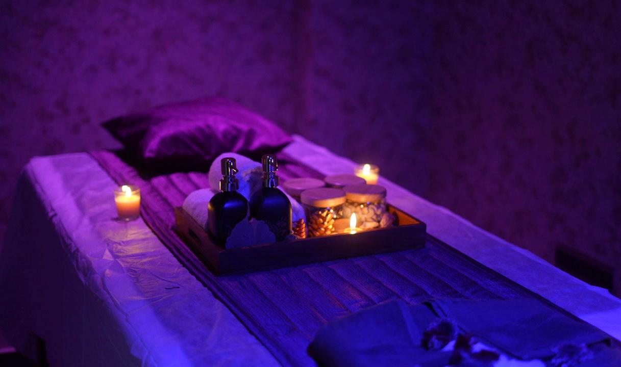 Candlelit massage room ambiance